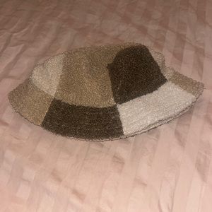 its a brown bucket hat